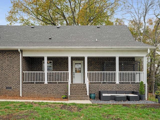 back of house featuring covered porch