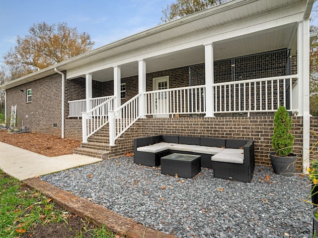 exterior space featuring outdoor lounge area and a porch