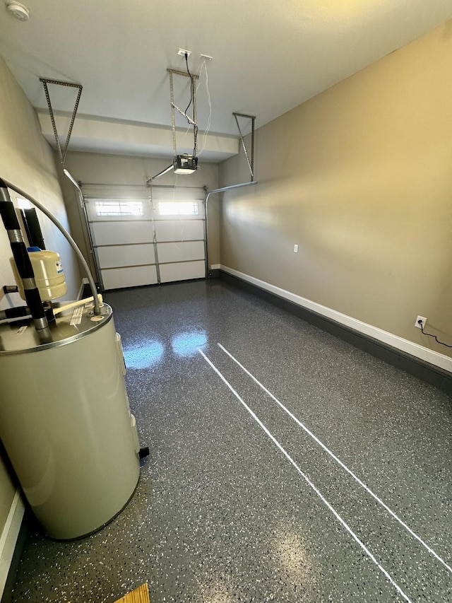 garage with a garage door opener and water heater