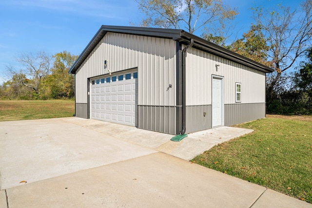 garage with a yard