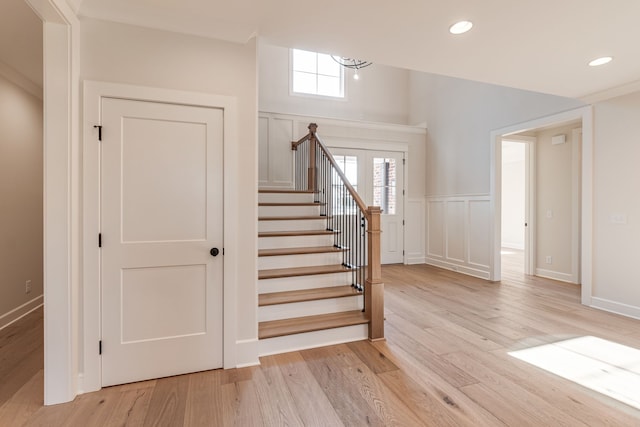 stairway featuring hardwood / wood-style flooring