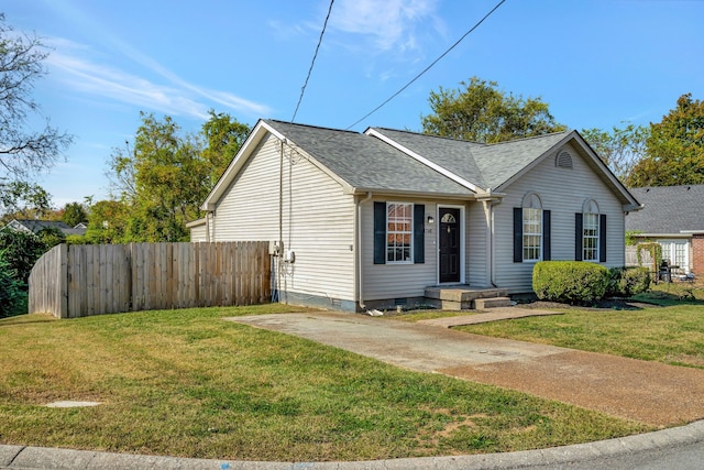 view of front of home with a front lawn