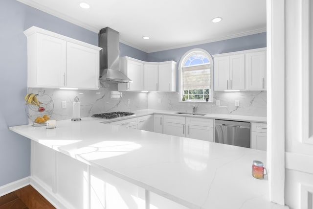 kitchen featuring decorative backsplash, white cabinetry, and stainless steel appliances