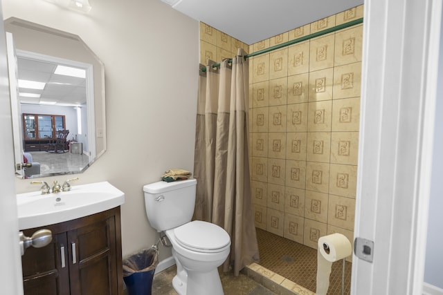 bathroom with toilet, tile patterned flooring, a shower with curtain, vanity, and tile walls