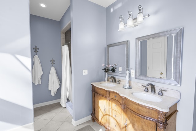 bathroom with vanity, a shower with curtain, and tile patterned floors