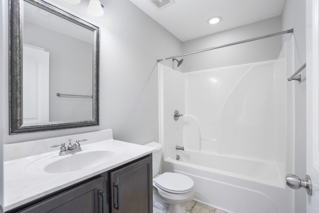 full bathroom with toilet, shower / washtub combination, vanity, and tile patterned flooring