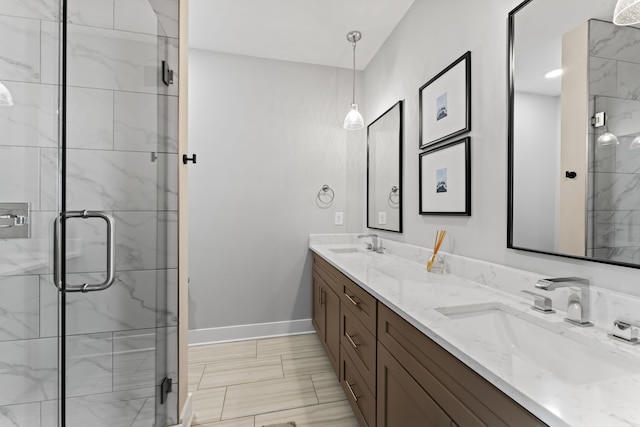 bathroom with vanity and an enclosed shower