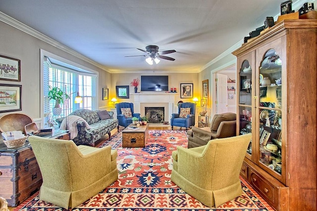 602 Edenburg Dr, Columbia, TN 38401 - living area with a fireplace with raised hearth, ceiling fan, and crown molding