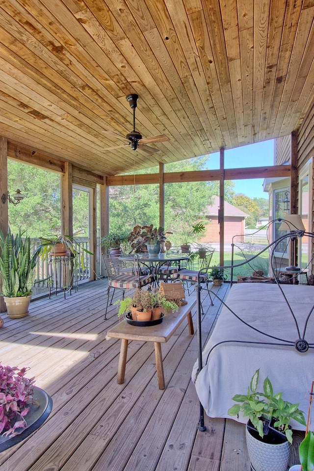 602 Edenburg Dr, Columbia, TN 38401 - sunroom with wood ceiling, outdoor dining space, hardwood / wood-style flooring, a ceiling fan, and a wooden deck