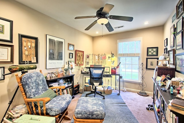 office featuring carpet floors and ceiling fan