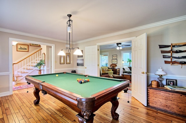 rec room with crown molding, light hardwood / wood-style flooring, and pool table