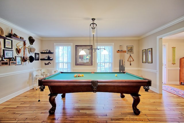 game room featuring pool table, light hardwood / wood-style flooring, and crown molding