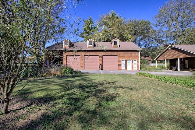 garage with a yard