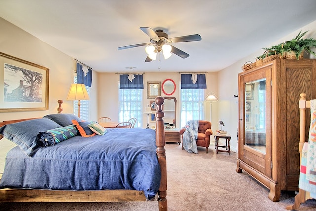 bedroom featuring ceiling fan and carpet flooring