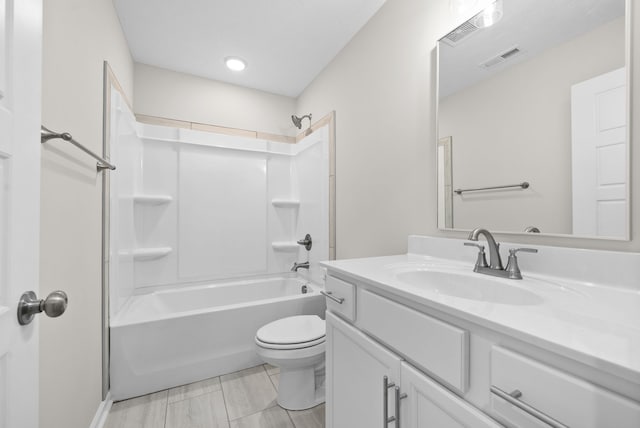 full bathroom with vanity, toilet, and tub / shower combination