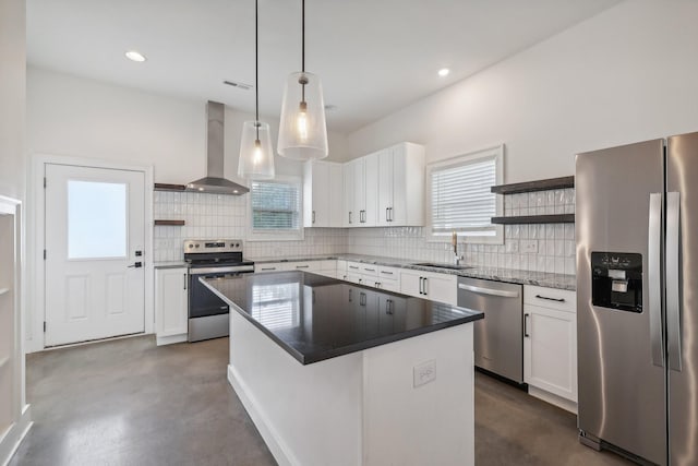 904 N Maple St, Murfreesboro, TN 37130 - kitchen with appliances with stainless steel finishes, open shelves, wall chimney range hood, a sink, and backsplash