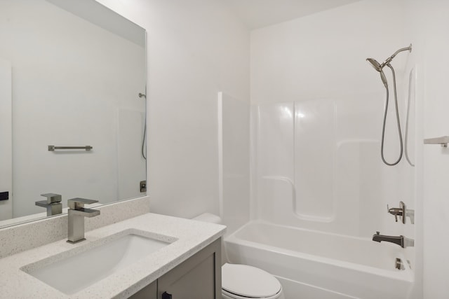 full bathroom featuring vanity, toilet, and tub / shower combination