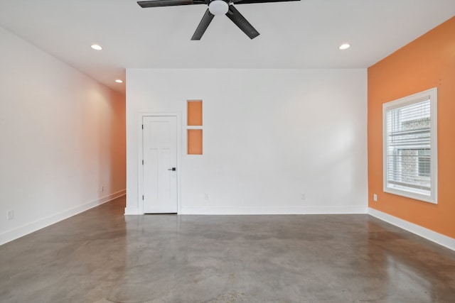 spare room featuring ceiling fan