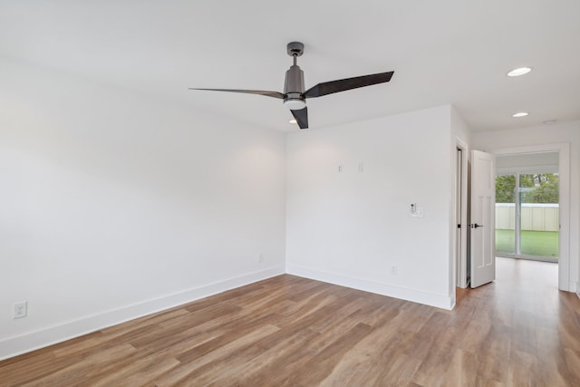 unfurnished room with light hardwood / wood-style flooring and ceiling fan