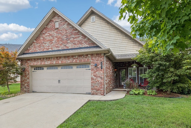 view of front facade with a front yard and a garage