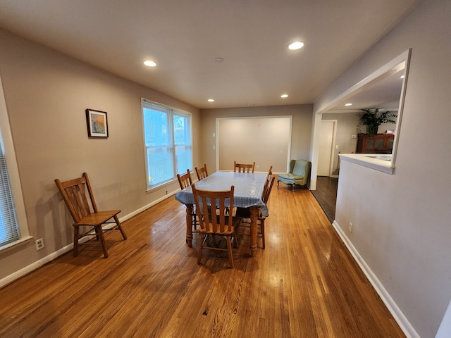 dining area featuring dark hardwood / wood-style floors