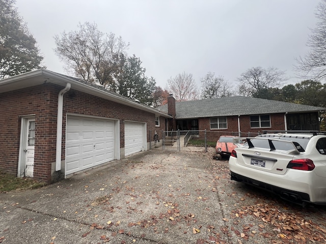 view of home's exterior with a garage