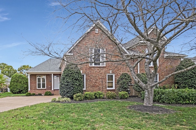 view of front of home with a front yard