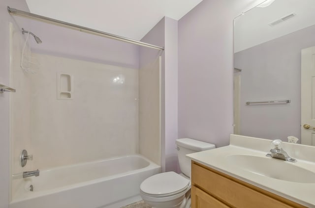 full bathroom featuring shower / tub combination, vanity, and toilet