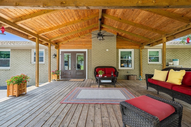 deck featuring french doors and outdoor lounge area