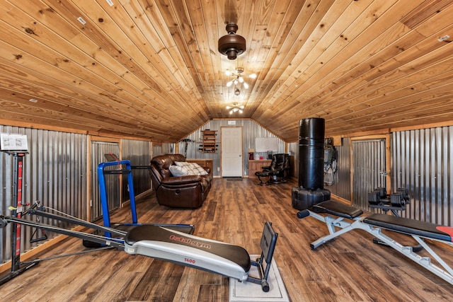 workout room with wood ceiling, wood walls, wood-type flooring, and vaulted ceiling