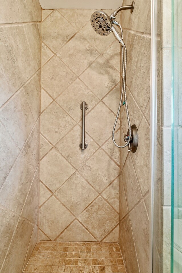 details with a tile shower