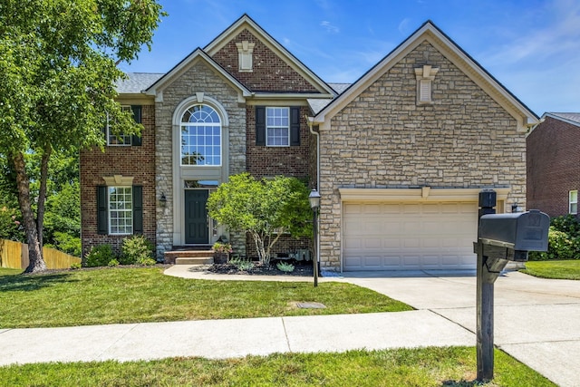 view of front property featuring a front yard and a garage