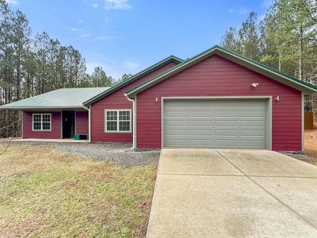 ranch-style house with a front lawn and a garage