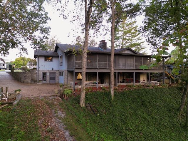 rear view of house featuring a patio area