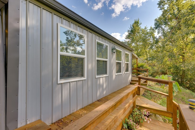 view of side of property featuring a deck