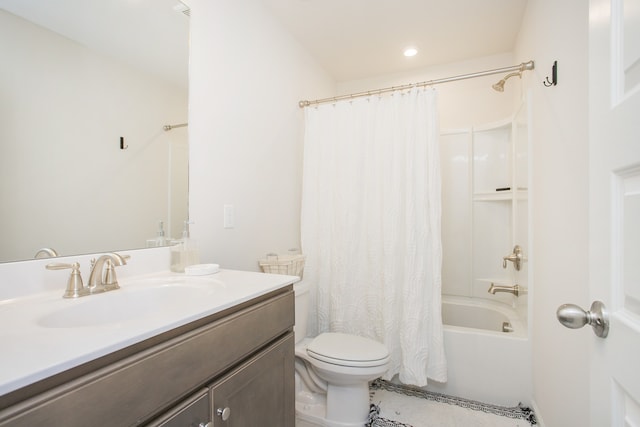 full bathroom featuring vanity, toilet, and shower / bath combo