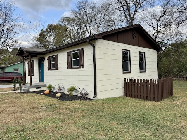 view of property exterior featuring a yard