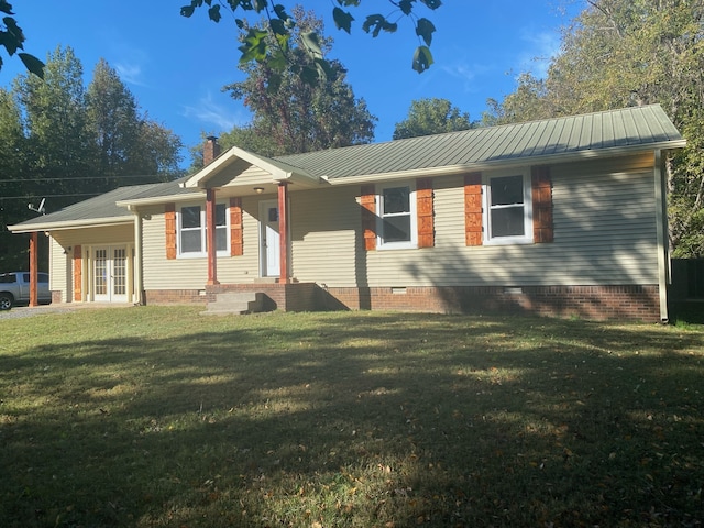 single story home with a front lawn