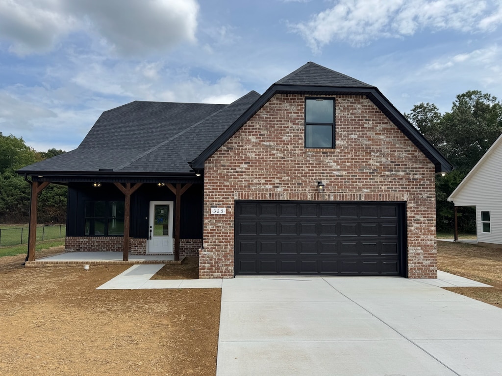 view of front of home with a garage