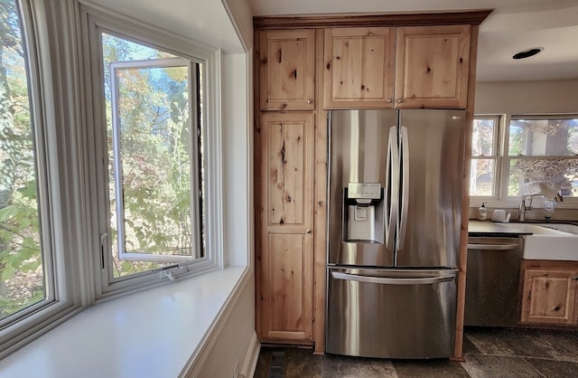 kitchen featuring sink and appliances with stainless steel finishes