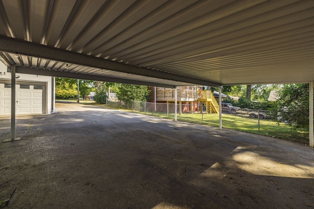 view of patio / terrace featuring a garage