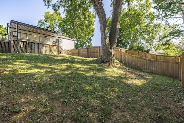 view of yard featuring a wooden deck