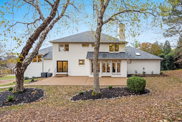 rear view of house with a patio