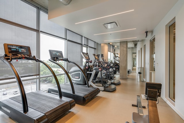 exercise room with a wall of windows