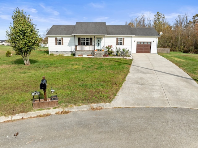 view of front of house featuring a front yard, a porch, and a garage