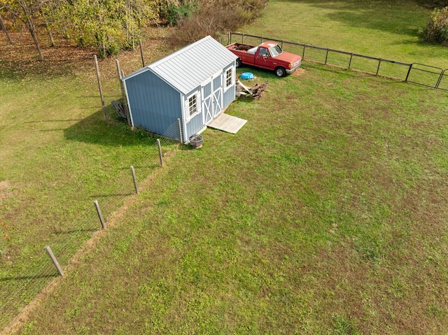 birds eye view of property featuring a rural view