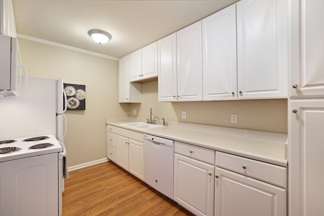 kitchen featuring white appliances, light hardwood / wood-style floors, sink, and white cabinets