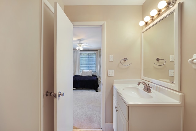 bathroom featuring vanity and ceiling fan