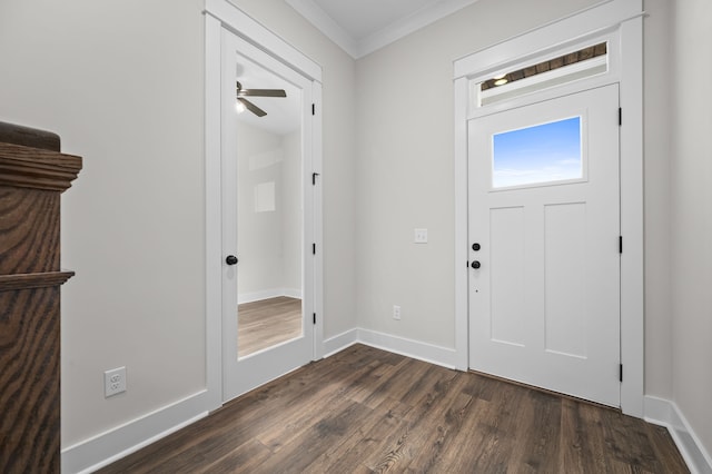 entrance foyer featuring ceiling fan, crown molding, and dark hardwood / wood-style flooring