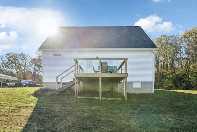 rear view of property with roof with shingles, stairway, a deck, and a yard